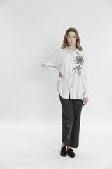 Брюки с вышивкой и пайетками